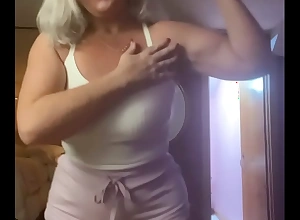 Curvy milf rosie working out the biceps close to booty shorts