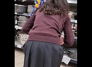 Spying legal age teenager girl at supermarket - short skirt